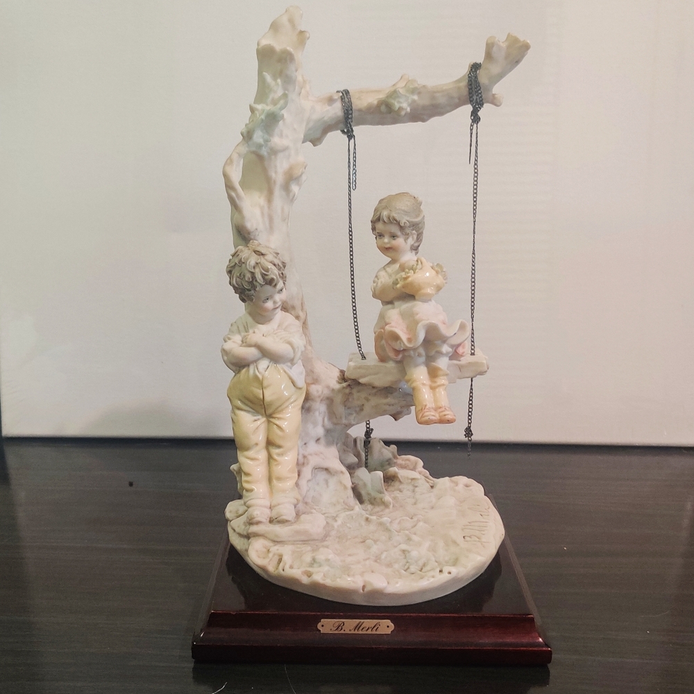 1983 VINTAGE FLORENCE B.MERLI PORCELAIN FIGURINE BOY GIRL ON SWING SIGNED EXC